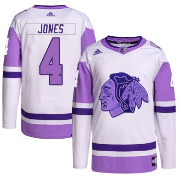 Adidas Chicago Blackhawks Youth Seth Jones Authentic White/Purple Hockey Fights Cancer Primegreen NHL Jersey
